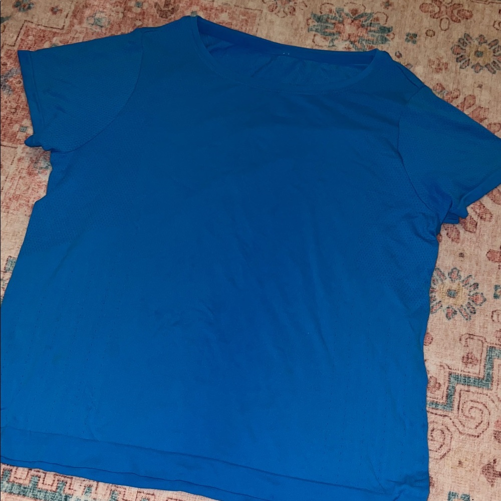Woman’s athletic blue shirt